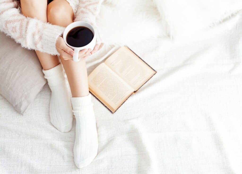 Female with coffee and book